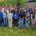 Diverse group of students outdoors at Boyce Thompson Institute campus for scientific research and education.