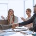 handshake business people at a meeting in the office