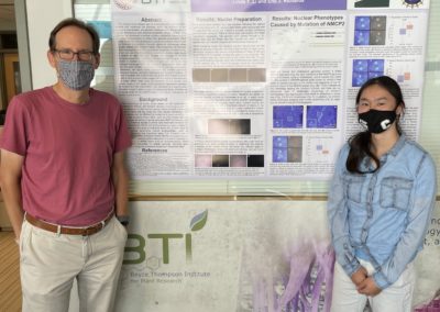 Linda Li with Eric Richards at the poster session