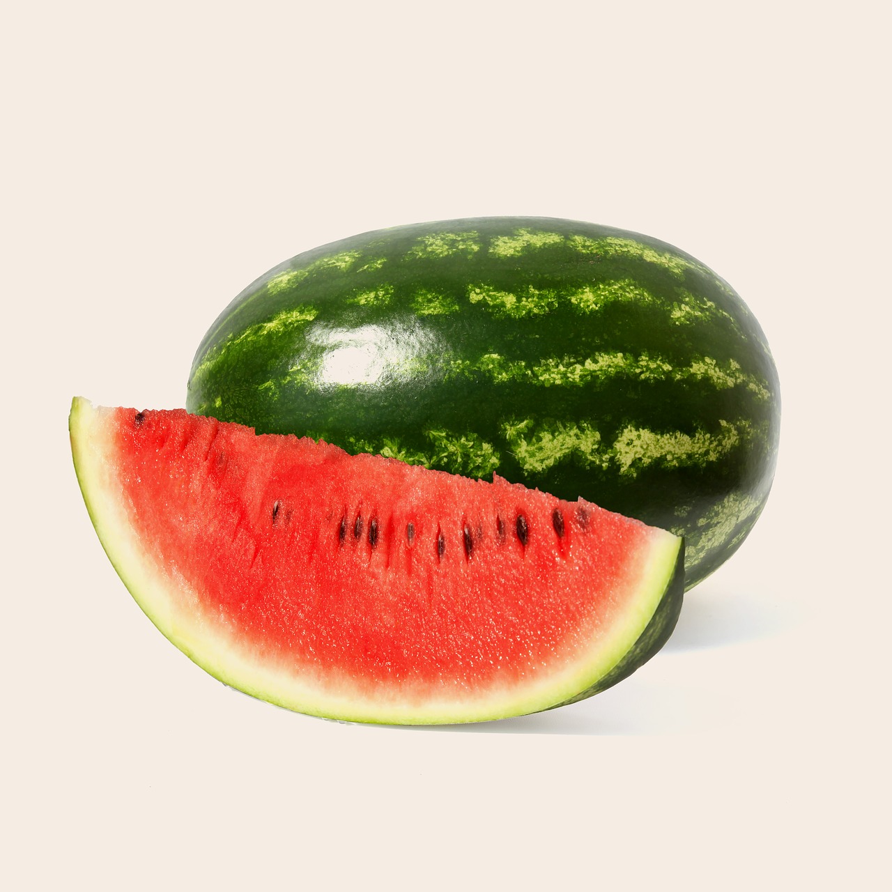 A whole watermelon and a cut watermelon